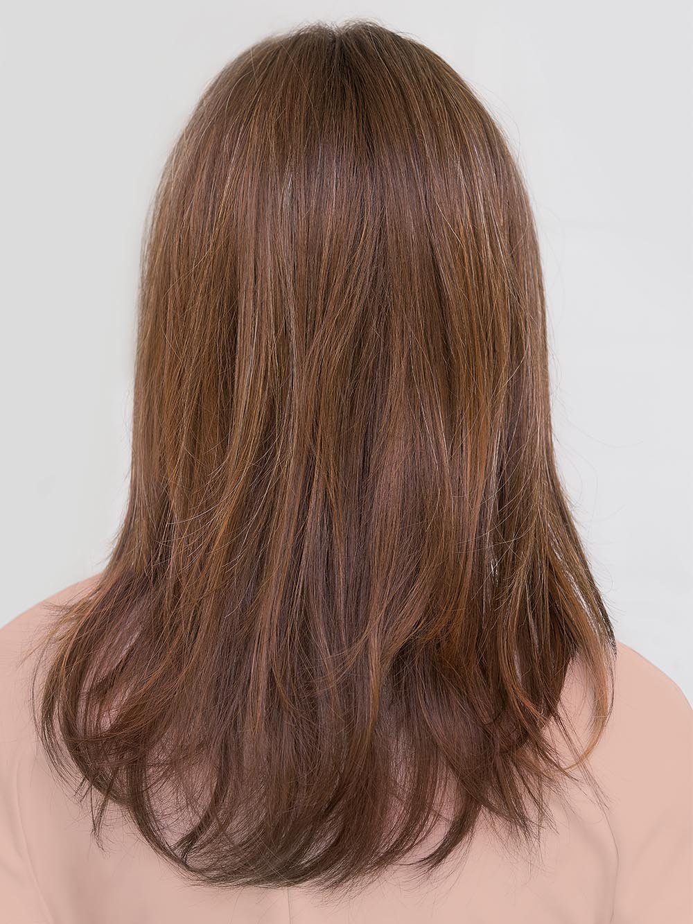 With beautiful long layers all over that gently cascade down over your shoulders. A Long enough style that could be worn up or down