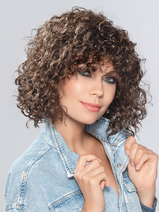 Her curls are soft and will give you a bounce in your step all thru the day
